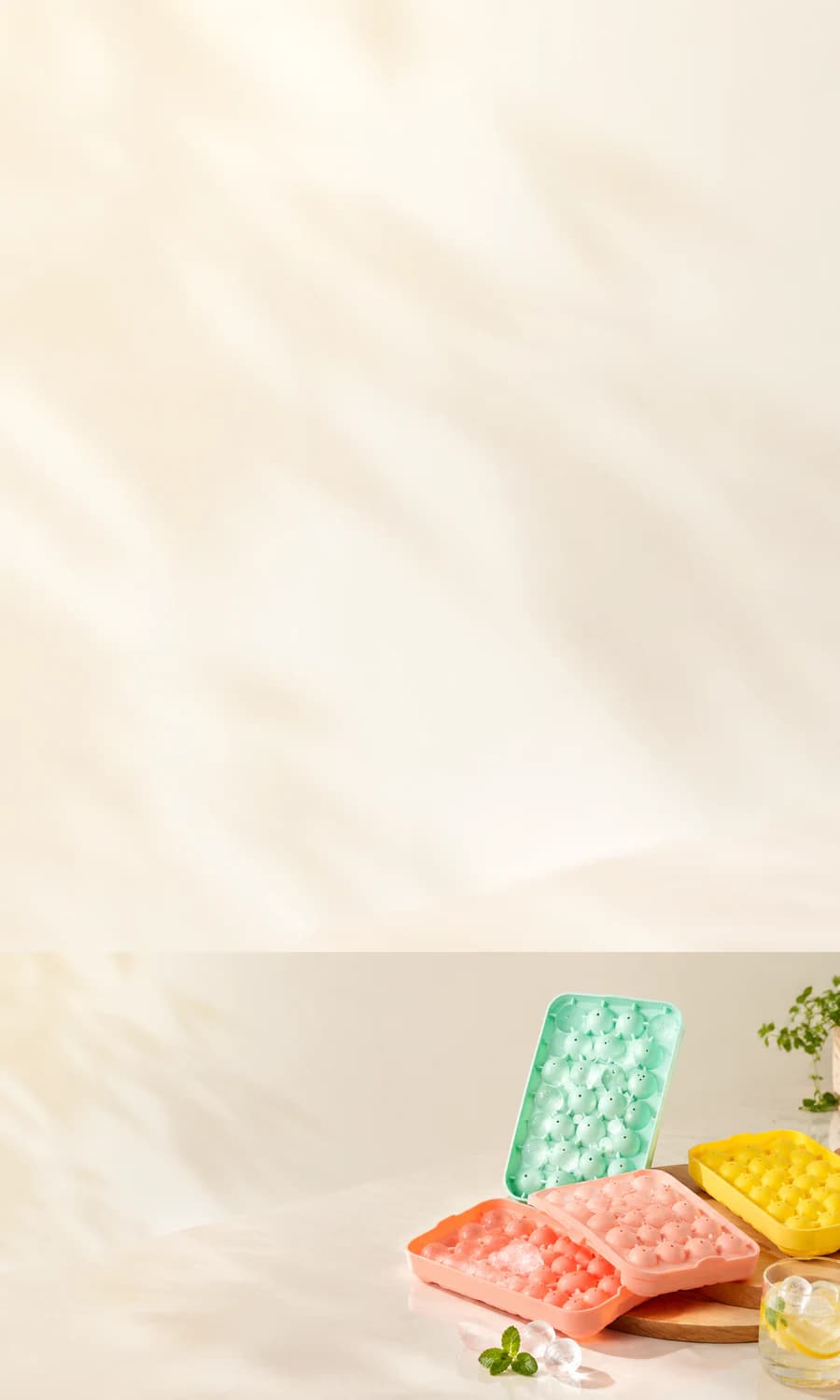 Four Obsoorth ice tray models in a warm kitchen setting