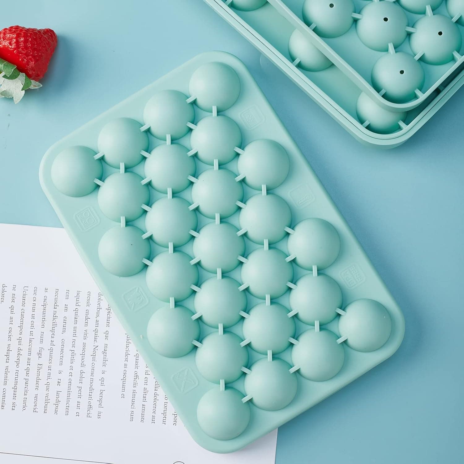Close view of the round cavities in the Obsoorth green silicone ice tray